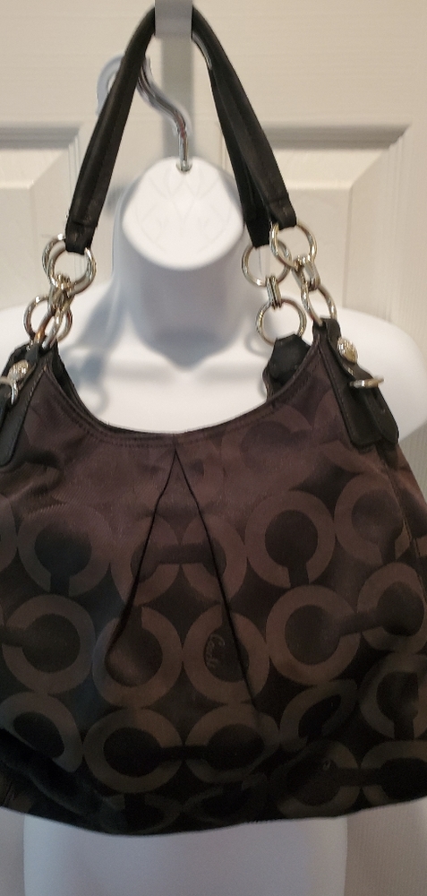 Black Coach purse with purple lining
